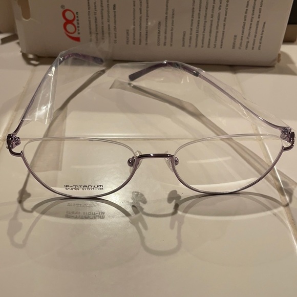 Accessories - Brand titanium glasses frames with cubic zirconium in lavender color.